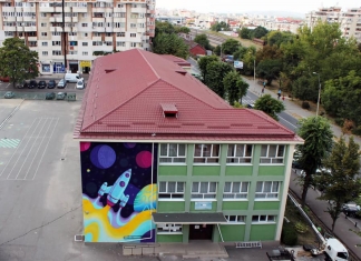 Un început de an mai colorat: Picturi murale, realizate de artiștii urbani la o școală din Pitești FOTO