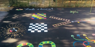 Școala bucuriei, la Pitești. Profesorii, părinții și elevii au pictat, într-o zi, curtea școlii. Daniela Stana: ”Din dragoste pentru copii, da, se poate!” FOTO